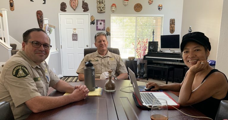 Lt. Kent and Lt. Rayls meeting during a community campaign.